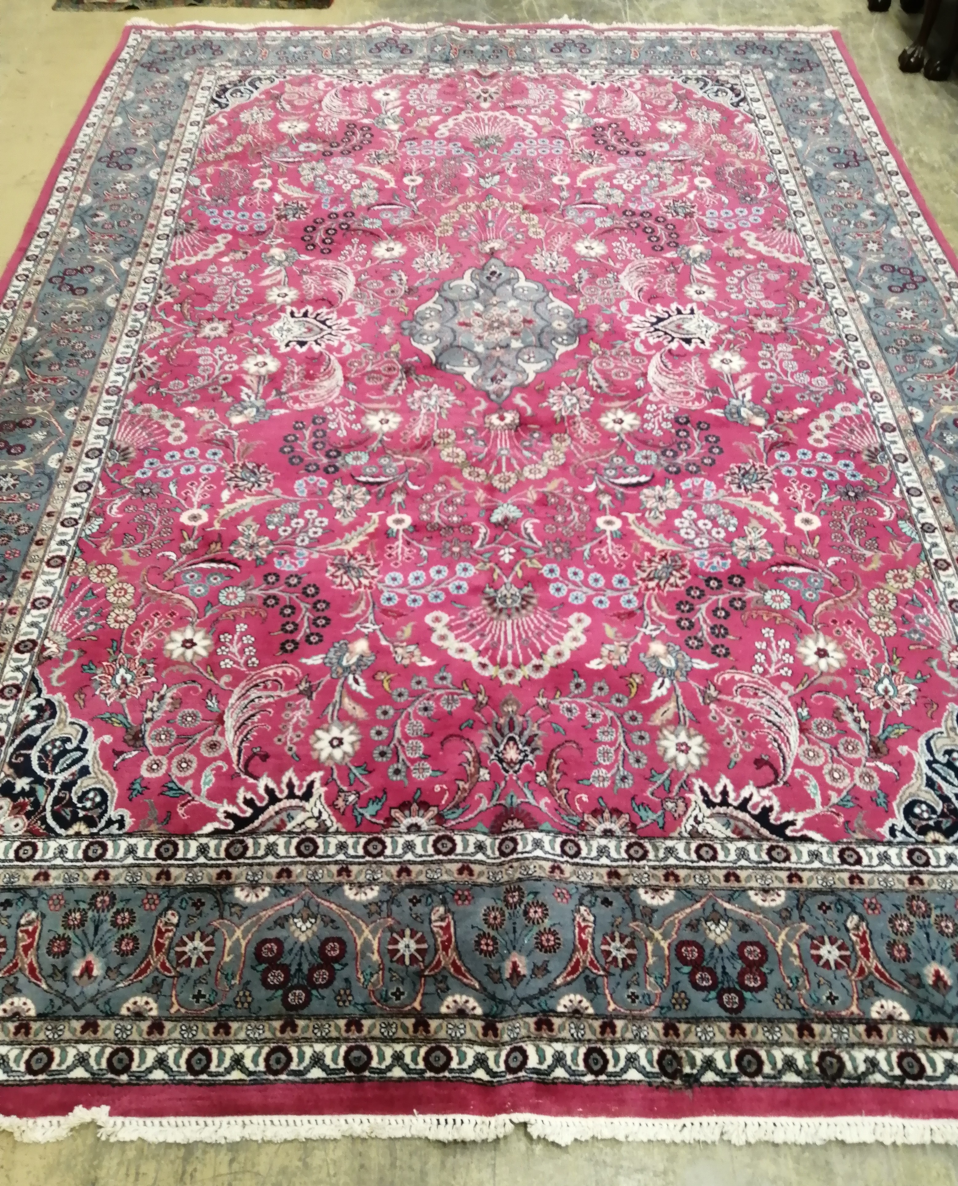 A fine North West Persian Kashan burgundy ground carpet, 336 x 242cm